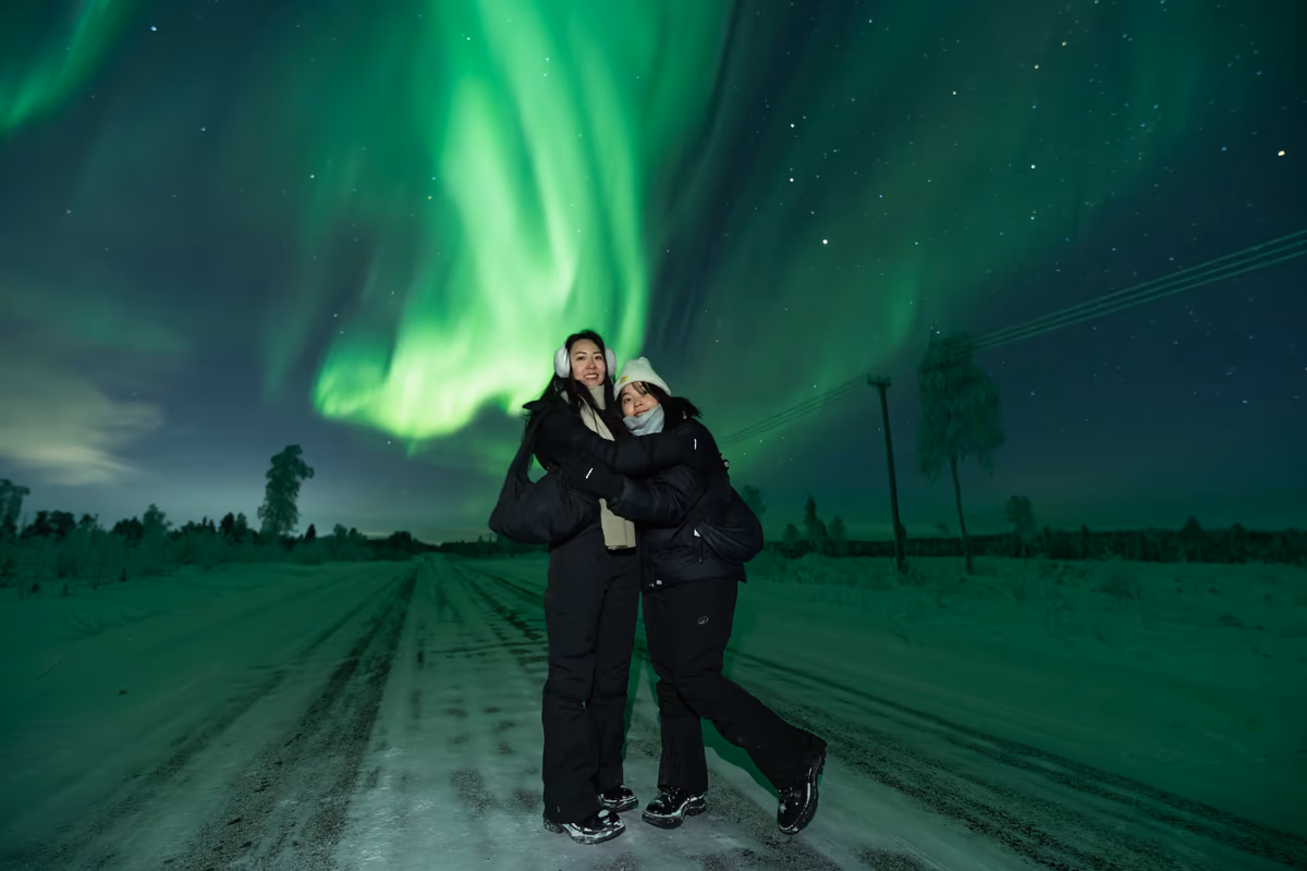 Guests watching the northern lights in Lapland